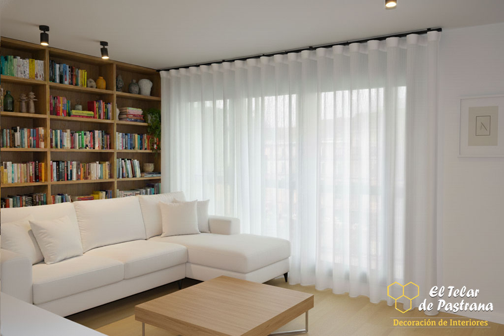 Onda Perfecta en Visillo Blanco salón biblioteca Madrid Proyecto 39: Salón biblioteca con sofá blanco y estantería a medida con onda perfecta - Madrid